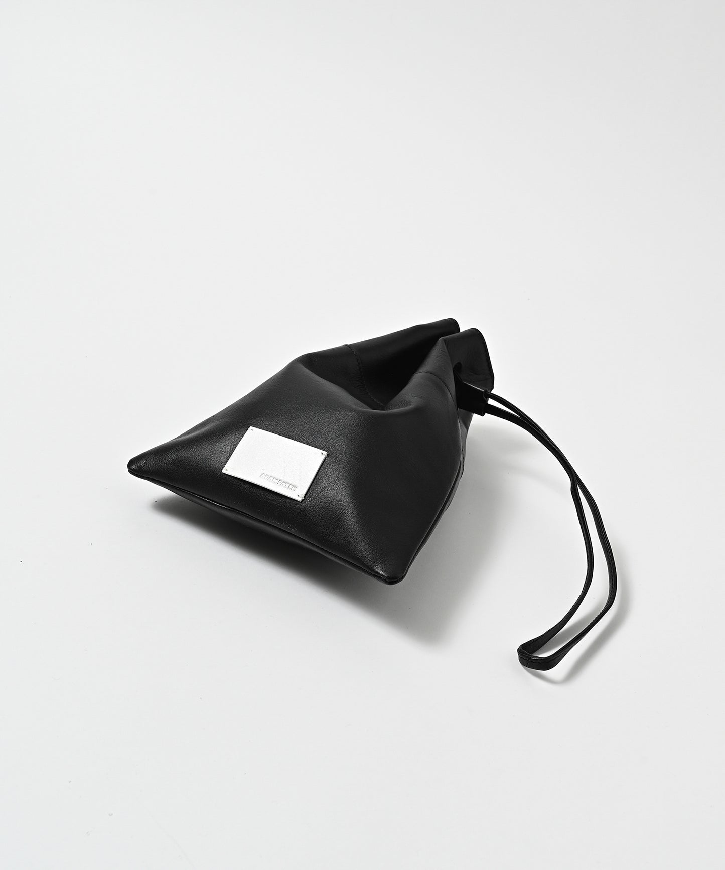 water repellent leather mini drawstring bag