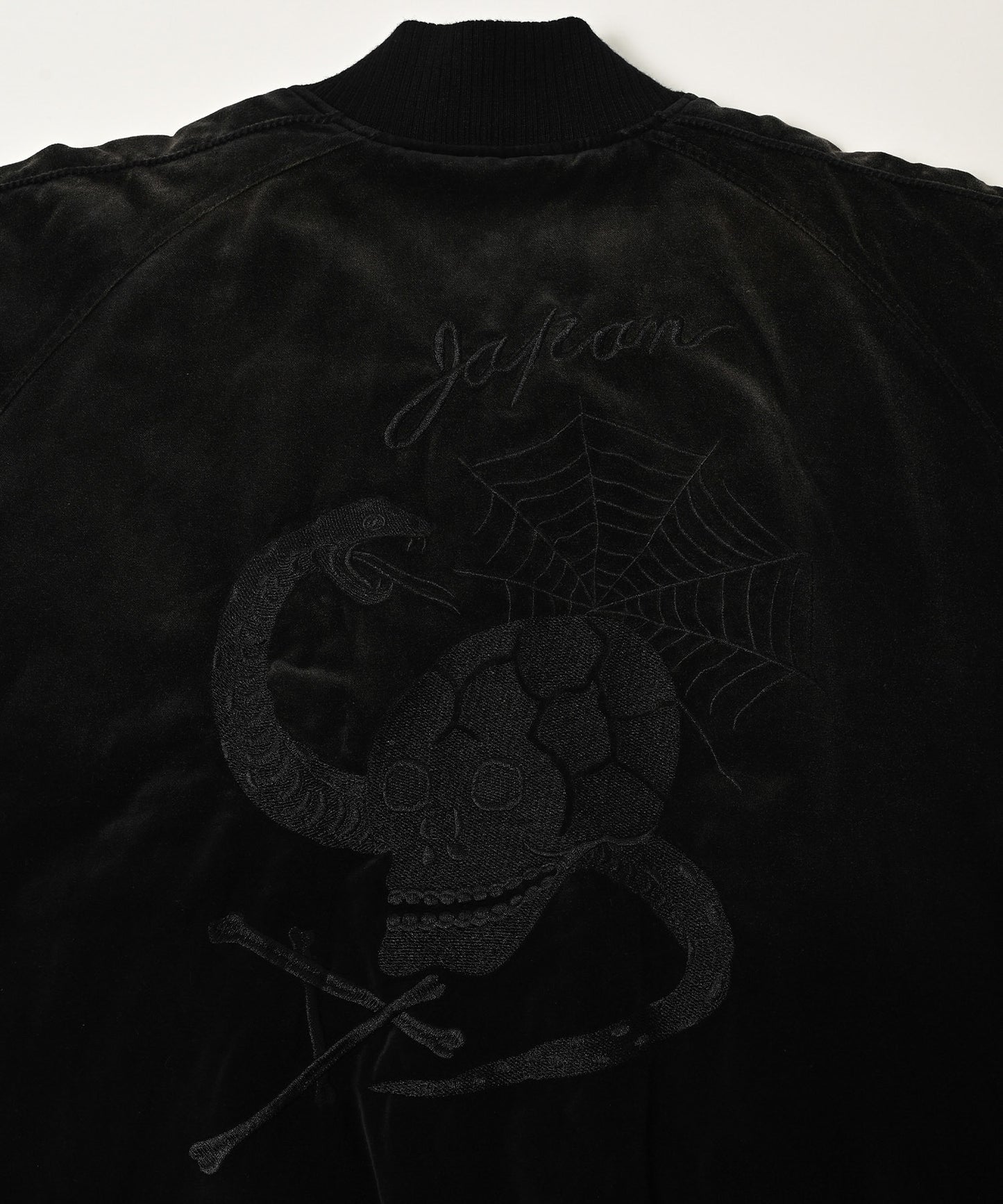 aged velour souvenir jacket