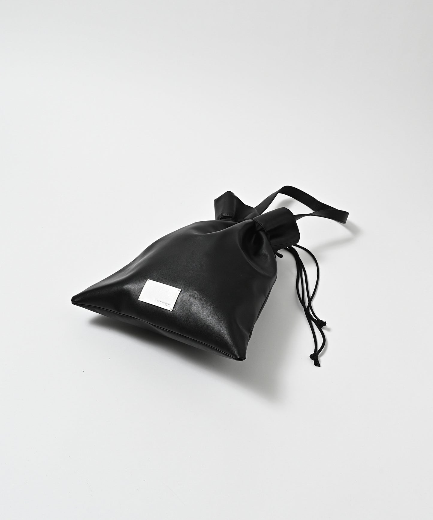 water repellent leather medium  drawstring bag