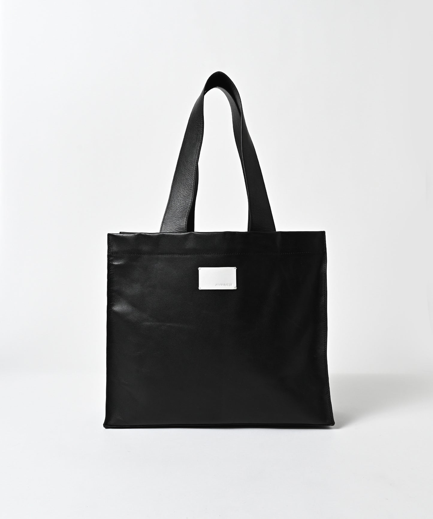 water repellent leather medium tote bag