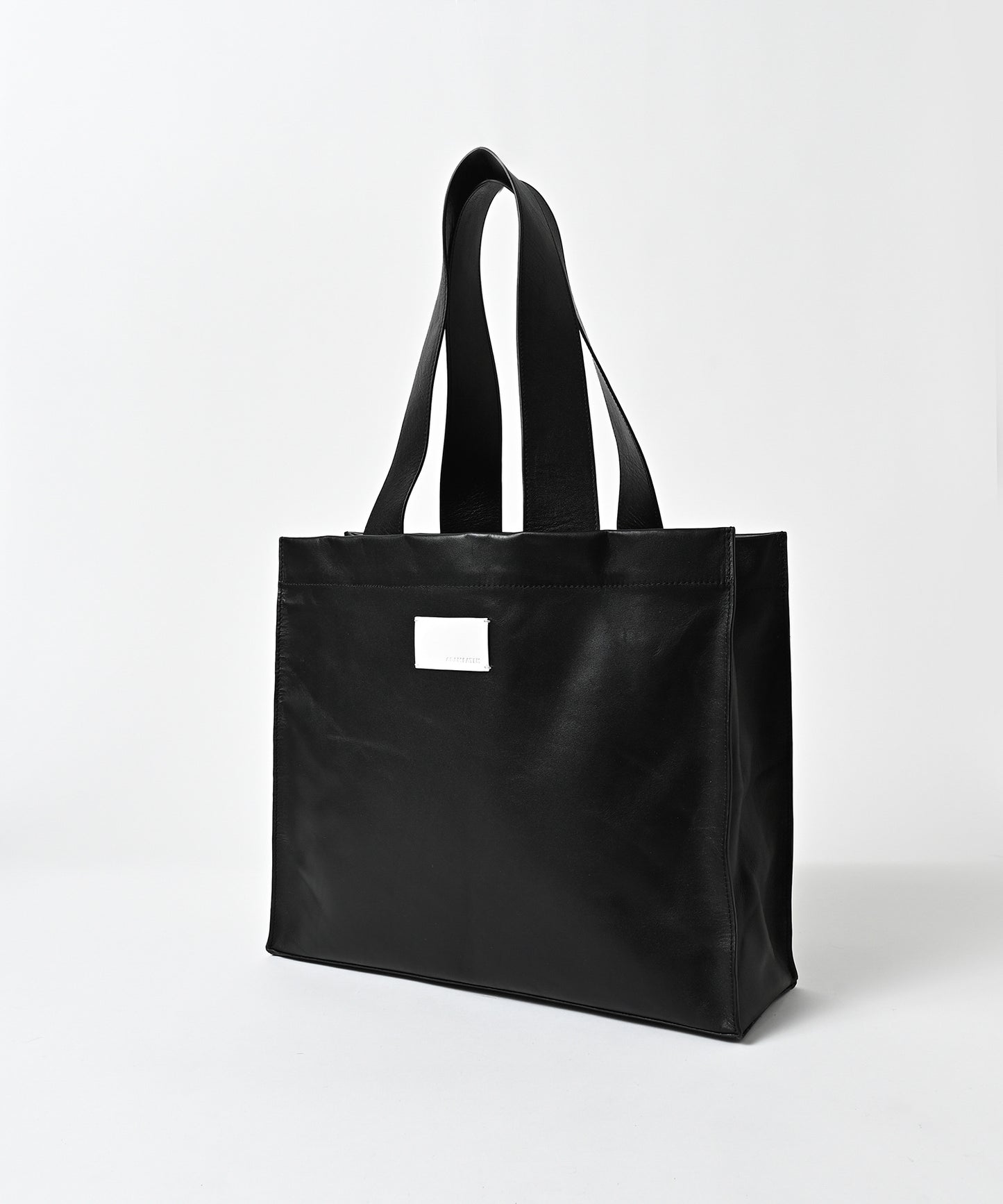 water repellent leather medium tote bag