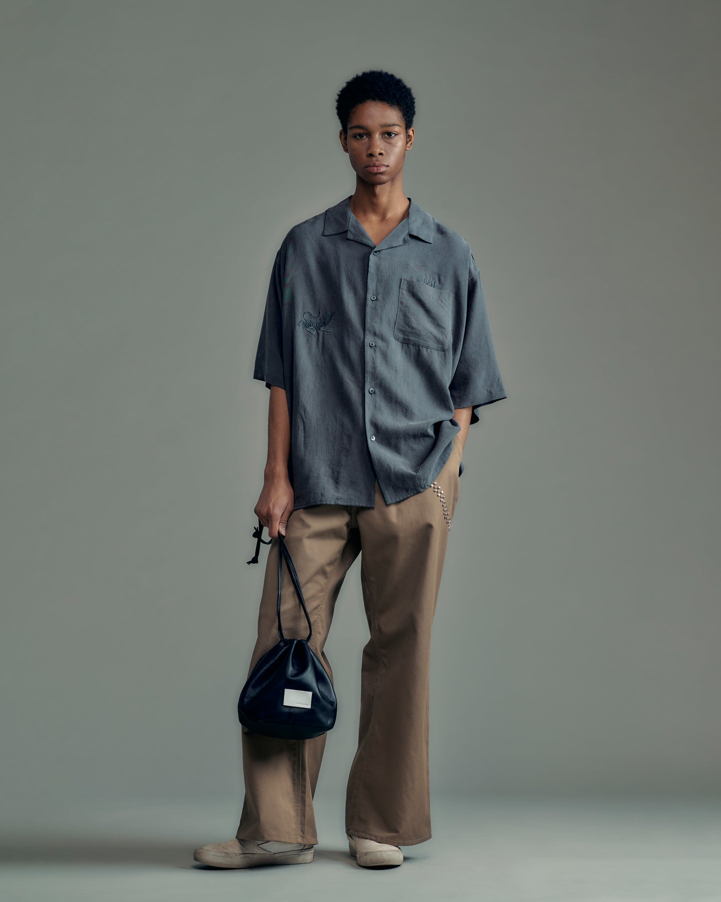 water repellent leather drawstring bag