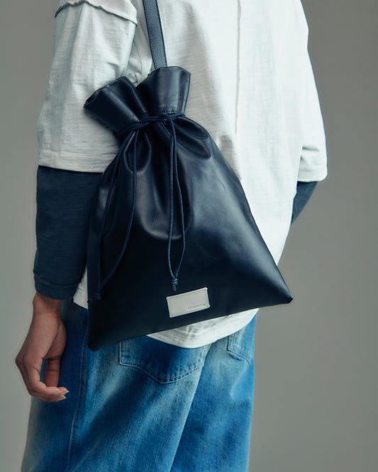 water repellent leather medium  drawstring bag
